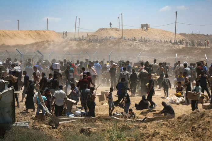 hospital-de-campana-en-gaza,-desbordado-por-victimas-de-disparos-cerca-de-puntos-de-ayuda